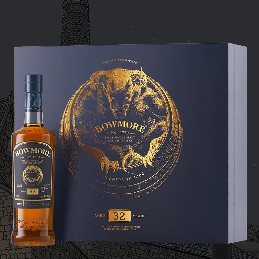 Bowmore Frank Quitely 32 Year Old No Corners and box on illustrative background