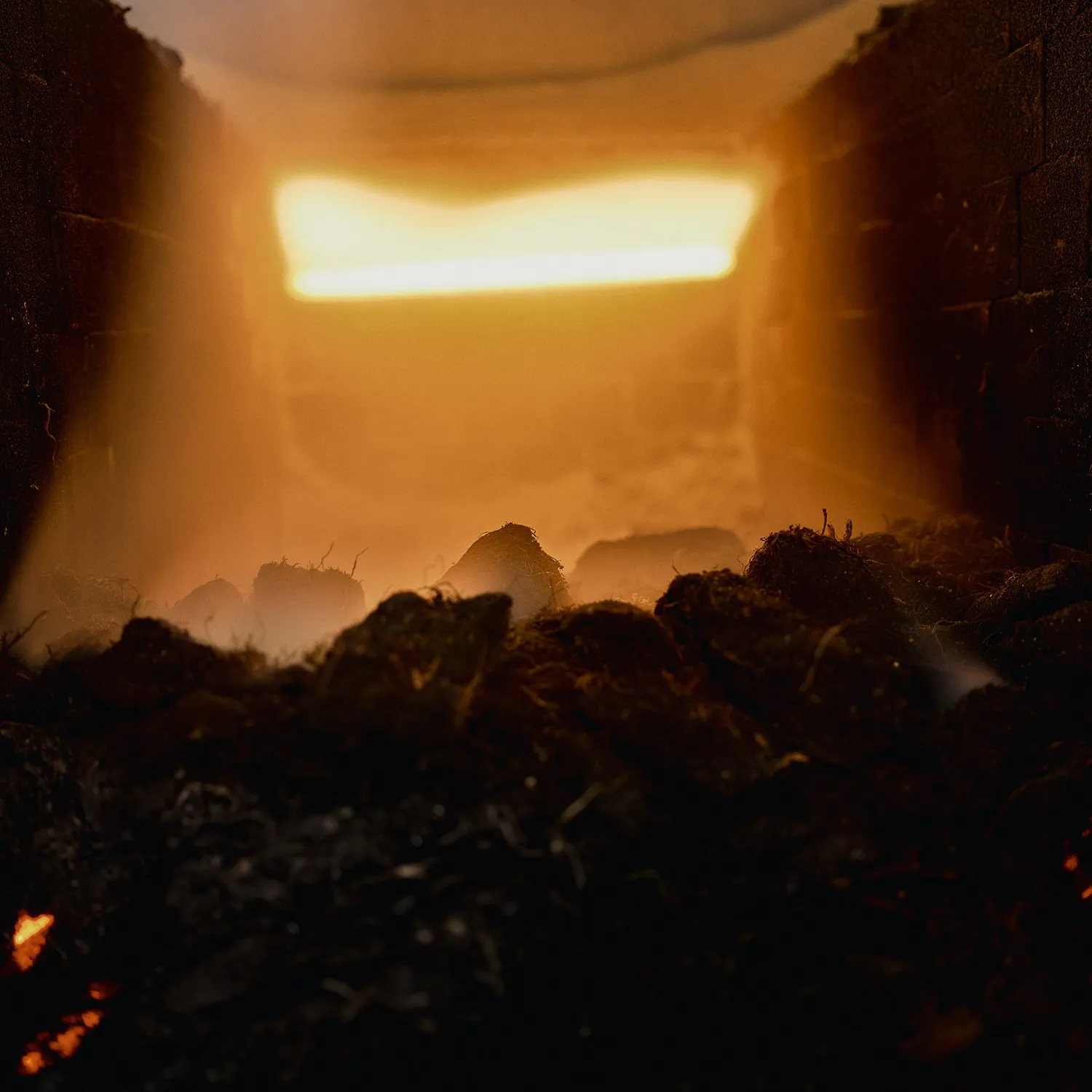 Close up of peat in furnace.